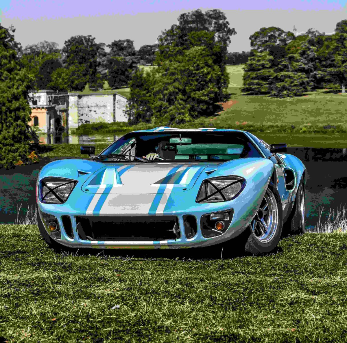 blue sports car at salon prive